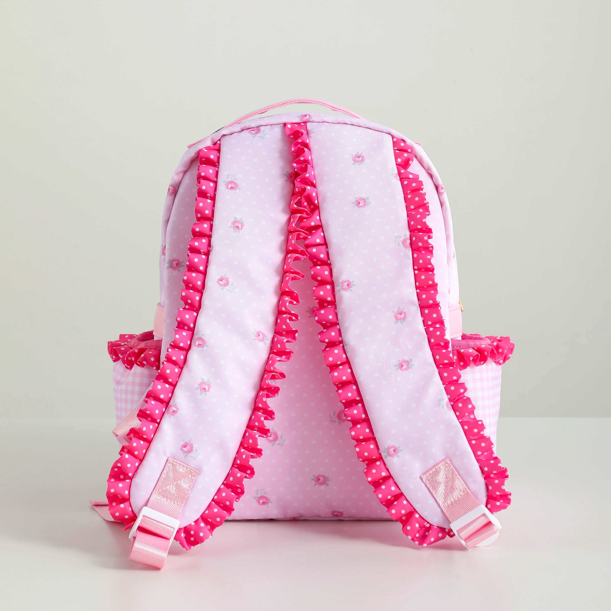 Sac à dos pour filles avec volant, en toile florale avec doublure à pois ou carreaux. Avec sa grande capacité et son design rose mignon, il est parfait pour le retour à l'école.