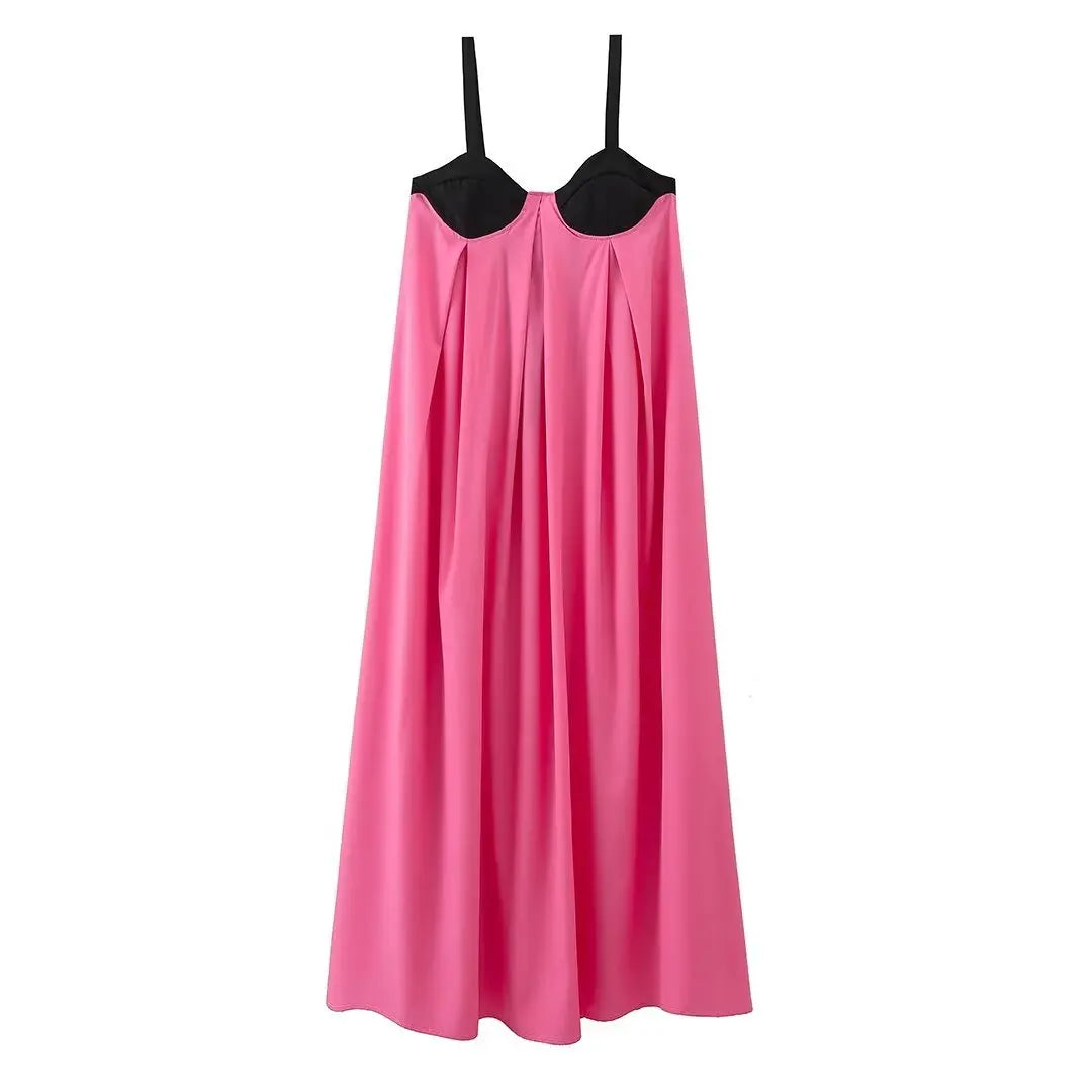 Adoptez la tendance estivale avec cette robe longue dos nu à fines bretelles. Élégante et fluide, elle offre un laçage au dos et des épaules dégagées, parfaite pour un look chic et décontracté lors de vos vacances ou soirées à la plage.