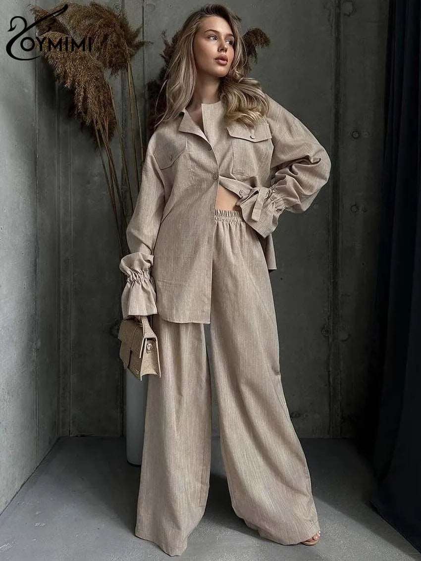 Affirmez votre élégance avec cet ensemble en coton khaki, chic et confortable.